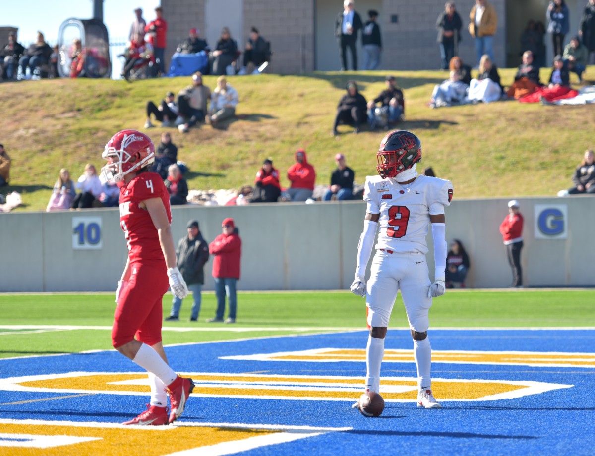 Del City's LaDainian Fields (right) reacts after scoring a touchdown during the Eagles' Class 5A semifinal win against Claremore on Nov. 24, 2023.
